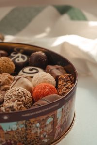 Metal tin filled with chocolates